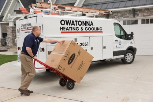 Man with furnace in box
